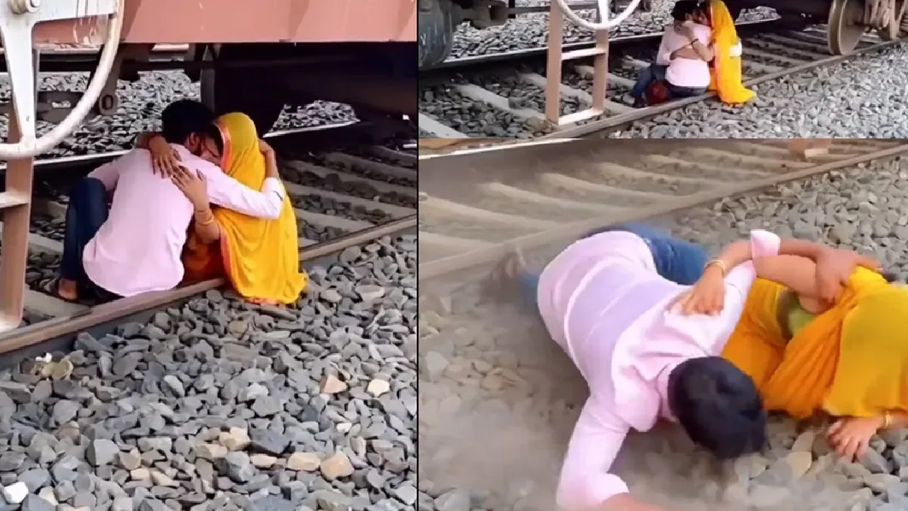 ரயிலுக்கு அடியில் தண்டவாளத்தில் அமர்ந்து ரொமான்ஸ் – தப்பிய ஜோடி