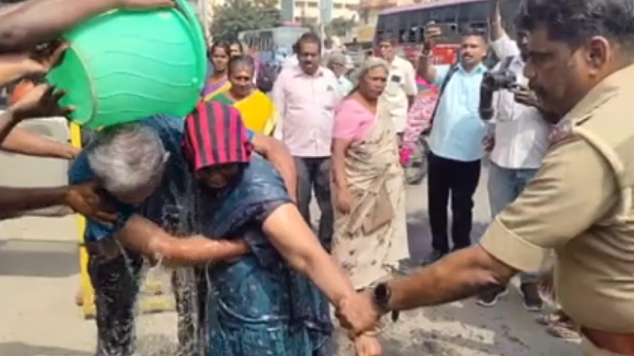 பட்டாவில் திருத்தம் மேற்கொள்ள வலியுறுத்தி தீக்குளிக்க முயன்ற தம்பதி!